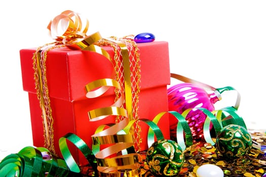Christmas gift in a red box, Christmas decorations and konfitti