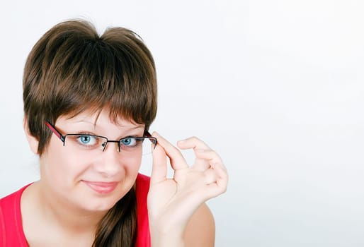 beautiful blue eyed young smiling girl in glasses