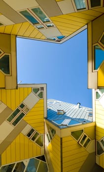 Cube houses, designed by architect Piet Blom. His design represents a village within a city, where each house represents a tree, and all the houses together, a forest