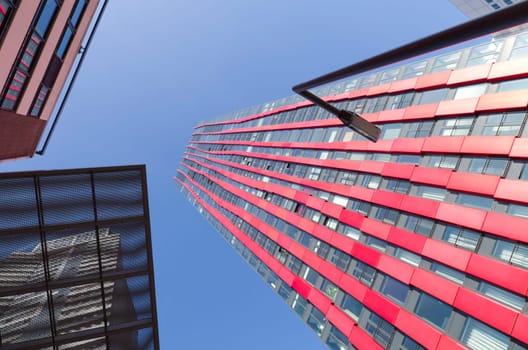 exterior of the 'red apple', a modern residential tower in Rotterdam. Designed by KCAP architects (exterior) and Jan des Bouvrie (interior), the 120 tall building counts 39 floors.