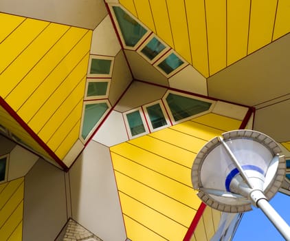 Cube houses, designed by architect Piet Blom. His design represents a village within a city, where each house represents a tree, and all the houses together, a forest