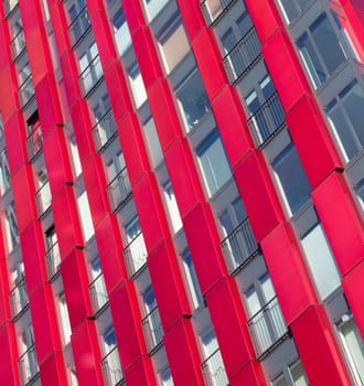exterior of the 'red apple', a modern residential tower in Rotterdam. Designed by KCAP architects (exterior) and Jan des Bouvrie (interior), the 120 tall building counts 39 floors.
