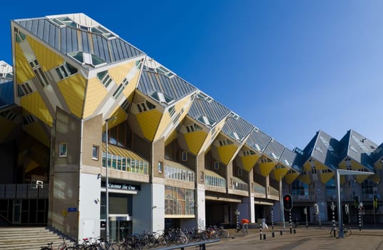 Cube houses, designed by architect Piet Blom. His design represents a village within a city, where each house represents a tree, and all the houses together, a forest