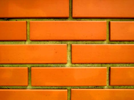 the wall was built of red bricks