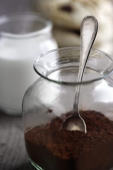 jar with cocoa powder and teaspoon