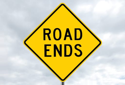 road sign - road ends, black on yellow, in clouds
