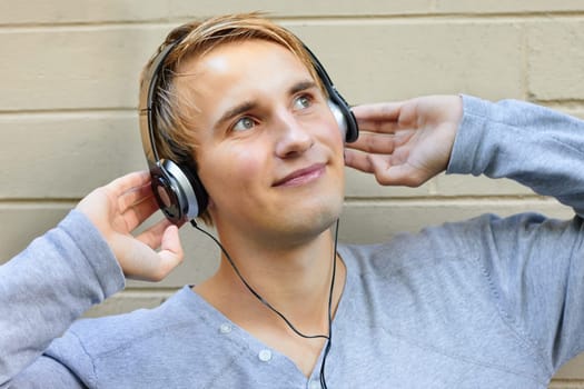 Young male dreaming of music