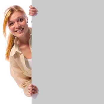 Portrait of a young cheerfull blonde woman with blank billboard, isolated on white background
