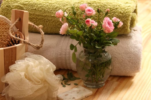 Roses, towels and spa accessories