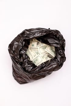A Rubbish bag full of dollars .