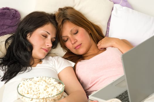 Best friends fell asleep during watching a movie