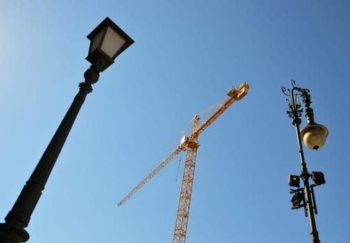 two lamps and a crane