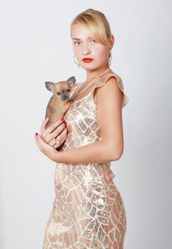Woman with Chiuahua in her arms