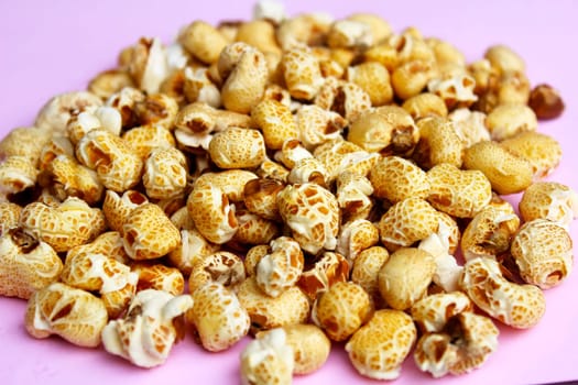 popcorn on a pink background