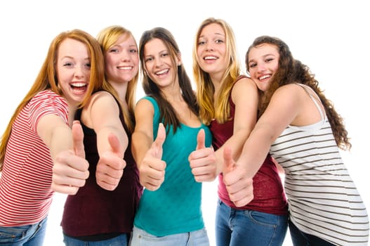Five girlfriends standing together, laughing at the camera and make the 'thumbs Up' gesture isolated against white background.