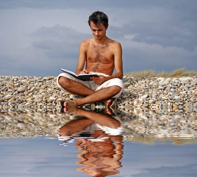reading a book in the beach