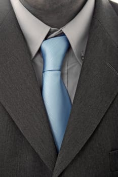 detail of a Business man Suit with blue tie