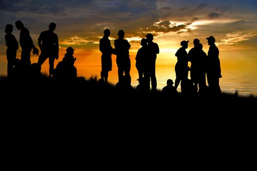 Young people enjoy in park at sunset
