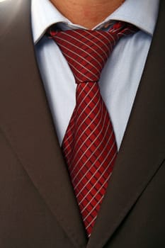 detail of a Business man Suit with red tie