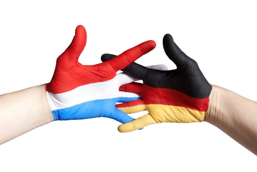 a handshake which symbolizes partnership between germany and dutch