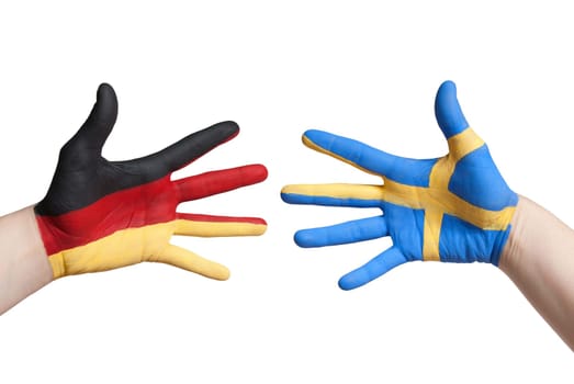 germany and sweden, symbolized with painted hands, isolated