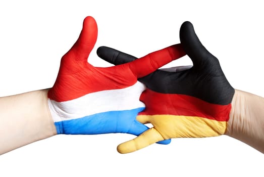 hands symbolizing the relation between dutch and germany