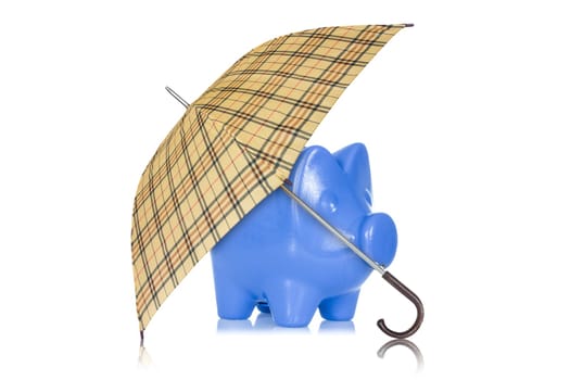 Financial protection. Piggy bank with umbrella on white background