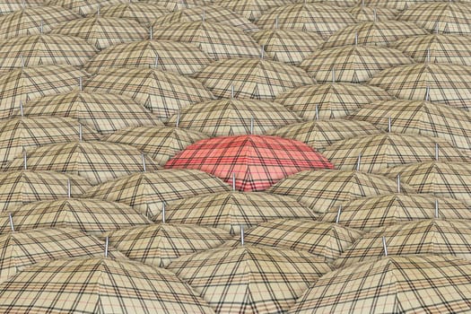 Red umbrella standing out from the other umbrellas.