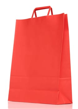 Red paper shopping bag isolated on white background
