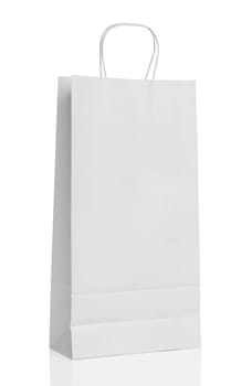 White paper shopping bag isolated with reflection