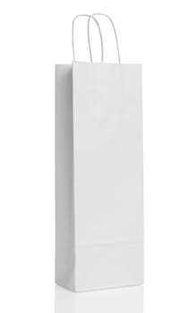 White paper shopping bag isolated with reflection