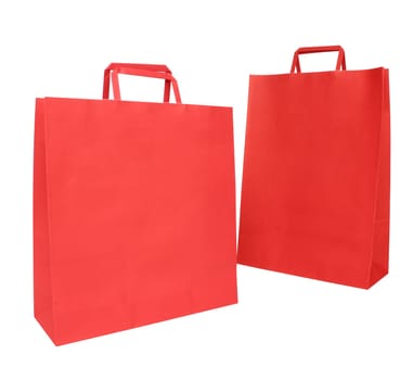 Two red paper shopping bags over white