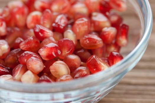 Pomegranate in glass bowl
