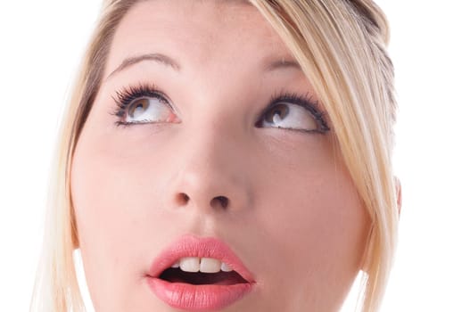 Young attractive woman rolls her eyes,isolated against a white background. Close-up of the face.