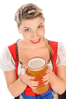 Young attractive woman with blond hair and braids wears a colorful dirdl dress and holds a mug of freshly tapped beer in her hand,exposed against a white background.