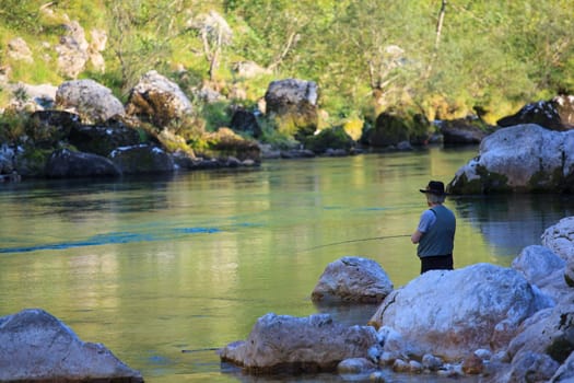 Photo of a Fisherman in the Soca river, Slovenia