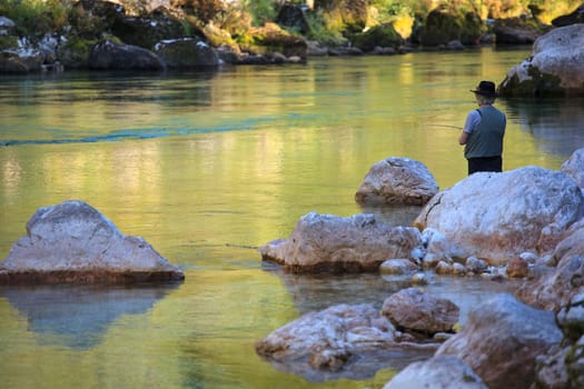 Photo of a Fisherman in the Soca river, Slovenia