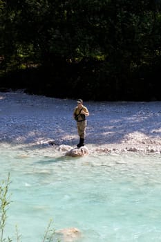 Photo of a Fisherman in the Soca river, Slovenia