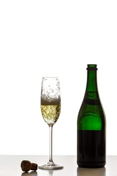 Pour sparkling wine into a glass