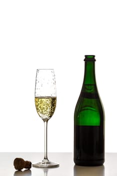 Pour sparkling wine into a glass