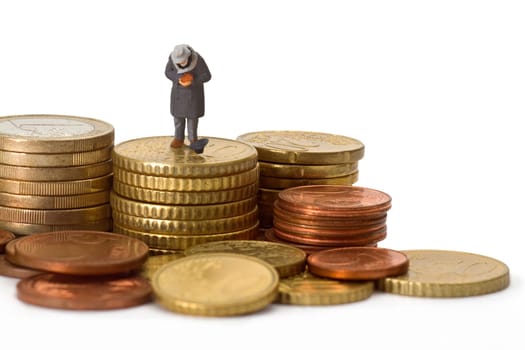 Model figure - beggar with euro coins freed on a light background