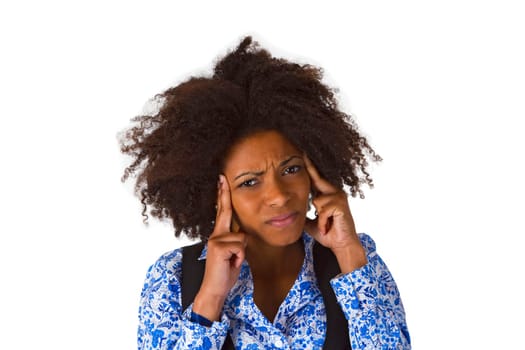 Young African-American woman holds hands to her temples - exposed on a white background