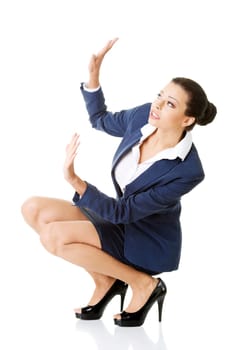 scared businesswoman defending herself,isolated on white background