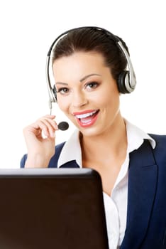 beautiful young call center assistant at the desk,isolated on white