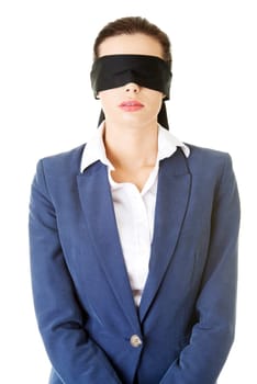 portrait of a beautiful young blindfold businesswoman,isolated on white