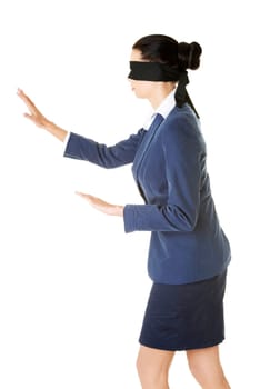 portrait of a beautiful young blindfold businesswoman,isolated on white