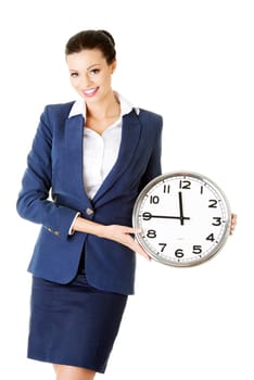 happy young attractive business woman holding office clock,isolated on white background