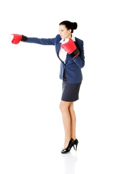 young businesswoman with boxing gloves,isolated on white background