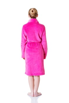 beautiful caucasian woman in bathrobe standing back to the camera,isolated on white background