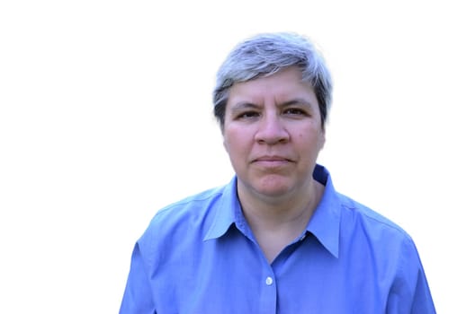 MIddle aged woman head shot with blue shirt isolated